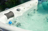Experience ultimate relaxation in this luxurious hot tub, perfect for unwinding after a long day.