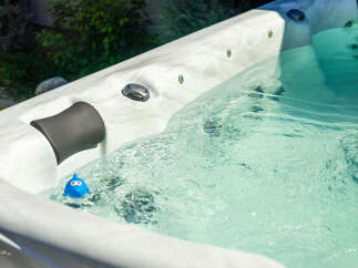 Experience ultimate relaxation in this luxurious hot tub, perfect for unwinding after a long day.