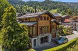 Experience luxury mountain living in this stunning wooden chalet, nestled amidst breathtaking alpine scenery.