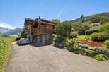 Experience luxury mountain living in this stunning wooden chalet, nestled amidst breathtaking alpine scenery.