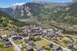 Discover this charming village nestled in a picturesque valley, surrounded by majestic mountains and lush greenery.