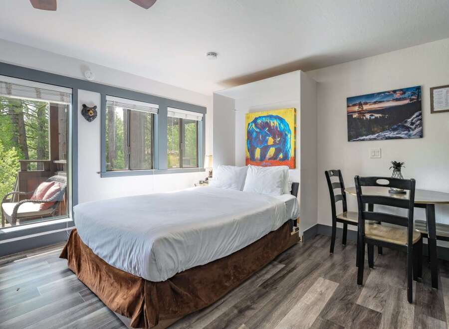 Experience cozy mountain living in this charming studio featuring a comfortable queen-size bed and a convenient dining area.