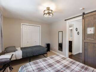 This charming bedroom features two comfortable beds, perfect for accommodating guests or family.