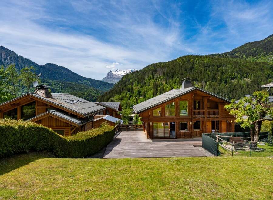 Experience luxury mountain living in this stunning wooden chalet, nestled amidst breathtaking alpine scenery.