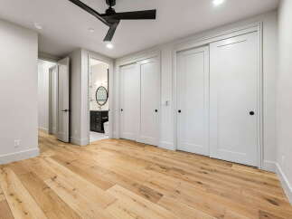 Step into this beautifully renovated space featuring gleaming hardwood floors that flow seamlessly throughout.