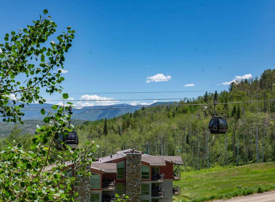 Experience breathtaking mountain views from this stunning property, featuring modern architecture and convenient access to ski lifts.