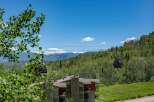 Experience breathtaking mountain views from this stunning property, featuring modern architecture and convenient access to ski lifts.