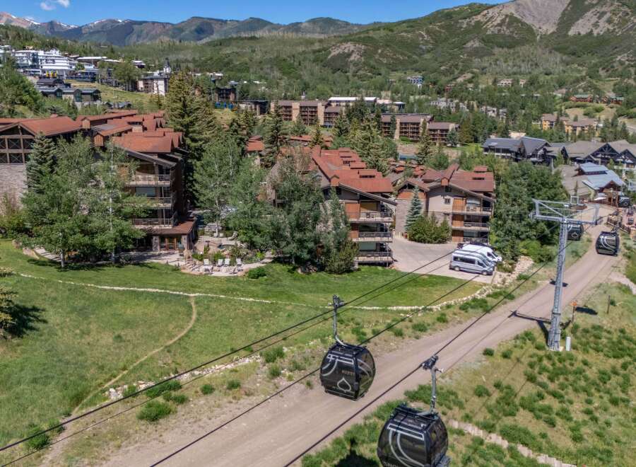 Experience mountain living at its finest with this stunning property featuring ski-in/ski-out access and breathtaking views.