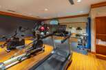 This well-equipped fitness center features a variety of cardio machines, including treadmills and ellipticals, perfect for your workout routine.