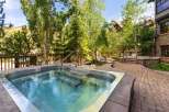 Relax and unwind in this luxurious outdoor hot tub, perfect for soaking up the mountain views.