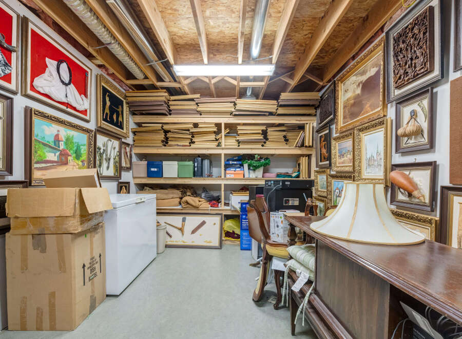 Discover a versatile storage space, perfect for art collections or general organization.