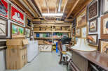Discover a versatile storage space, perfect for art collections or general organization.