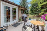 Enjoy outdoor living on this charming patio, perfect for entertaining or relaxing.