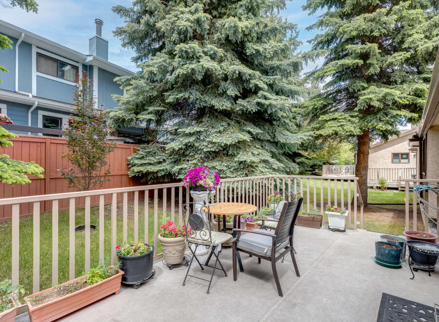 Enjoy outdoor living on this charming patio, perfect for relaxing or entertaining.