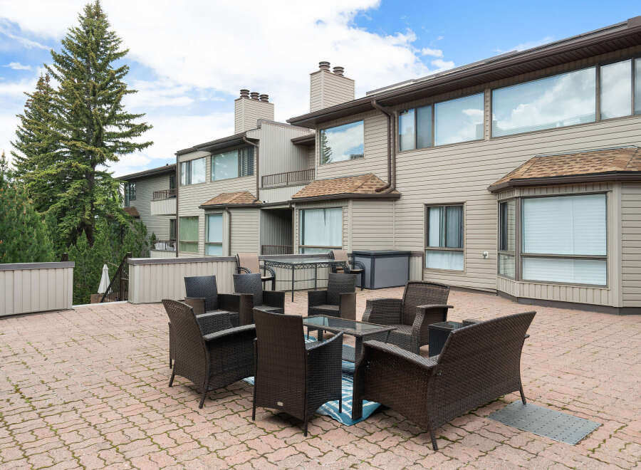 Enjoy outdoor living on this spacious patio, perfect for entertaining or relaxing.