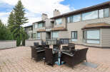 Enjoy outdoor living on this spacious patio, perfect for entertaining or relaxing.