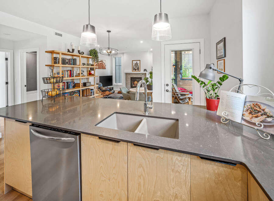 Experience modern living in this stunning open-concept kitchen and living area, perfect for entertaining.