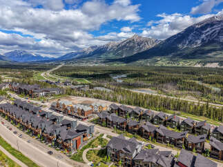 Discover modern living nestled against the majestic Rocky Mountains.