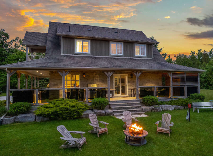 Experience the perfect blend of indoor and outdoor living with this stunning property, featuring a spacious covered porch ideal for entertaining and a cozy fire pit area for relaxing evenings.