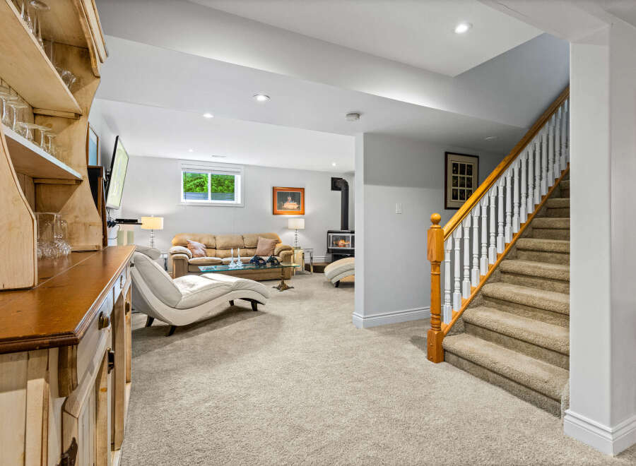 Discover this inviting finished basement, perfect for relaxation and entertainment.