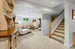 Discover this inviting finished basement, perfect for relaxation and entertainment.