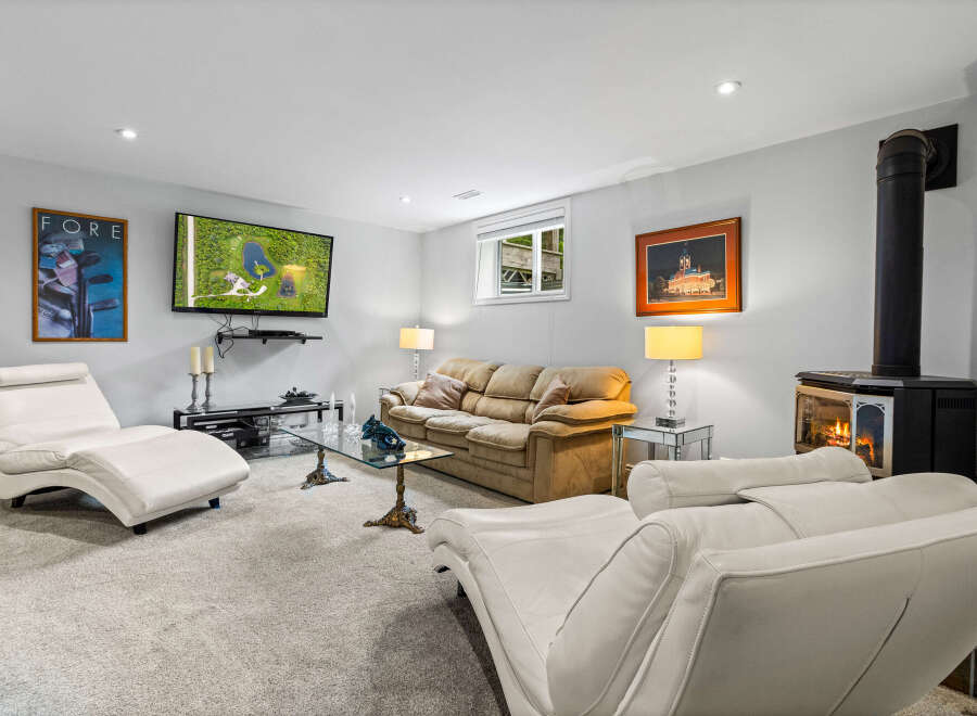 Experience ultimate comfort in this inviting living space, featuring plush seating arrangements perfect for relaxation and entertainment.