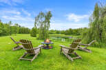 Enjoy the serene outdoors with this inviting fire pit area, perfect for gathering with loved ones.