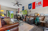 Step into this ultimate man cave, perfect for the sports enthusiast! Featuring comfortable leather seating, a cozy fireplace, and a dedicated space for golf clubs, this room is designed for relaxation and entertainment.