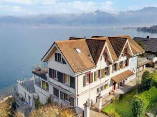 Experience breathtaking lake and mountain views from this stunning property, ideally situated on the waterfront.