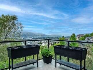 Enjoy breathtaking panoramic views from this stunning balcony, perfect for outdoor entertaining or quiet relaxation.