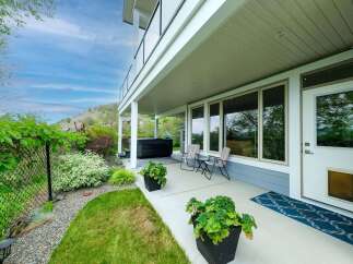 Enjoy outdoor living with this property's spacious covered patio, perfect for relaxing or entertaining.