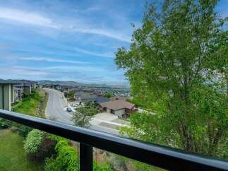 Experience breathtaking panoramic views from this stunning property, offering a serene escape with a picturesque landscape.