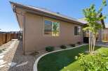 Discover this charming home featuring a well-maintained exterior with a stucco finish and a durable asphalt shingle roof.