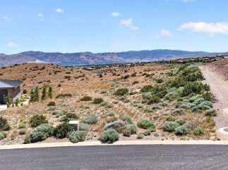 Discover this stunning property with panoramic mountain views, perfect for building your dream home.