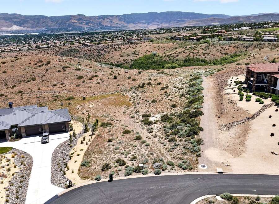 Discover this stunning property offering breathtaking panoramic views of the surrounding mountains and valley.