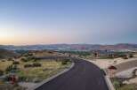Experience breathtaking panoramic views from this stunning luxury estate, perched high above the city lights.