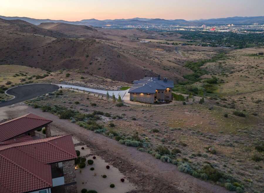 Experience luxury living in this stunning modern home nestled in the scenic hills.