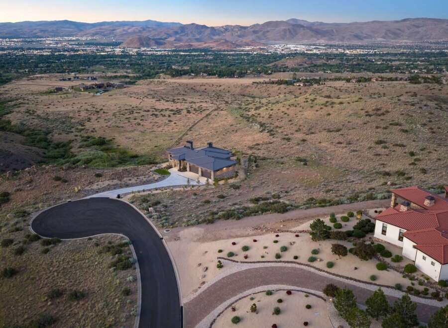 Experience luxury living in this stunning modern home, nestled in a serene, elevated landscape with breathtaking panoramic views of the city and mountains.