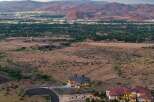 Experience luxury living in this stunning estate, nestled amidst rolling hills with panoramic views of the city lights and majestic mountains.