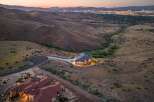 Experience luxury living in this stunning custom-built estate, nestled amidst rolling hills with panoramic city views.