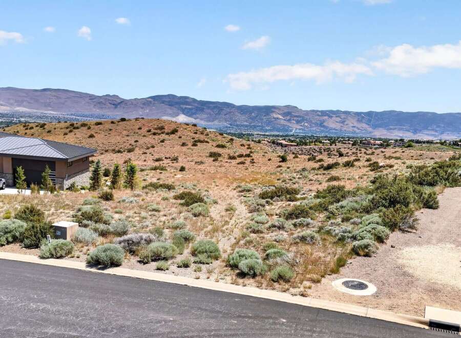 Discover breathtaking panoramic views from this prime residential lot, offering a serene desert landscape with distant mountain vistas.