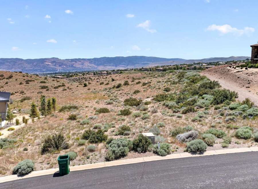 Discover this stunning vacant lot offering breathtaking panoramic views of the surrounding mountains and valley.