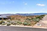 Discover breathtaking panoramic views from this elevated lot, perfect for building your dream home.