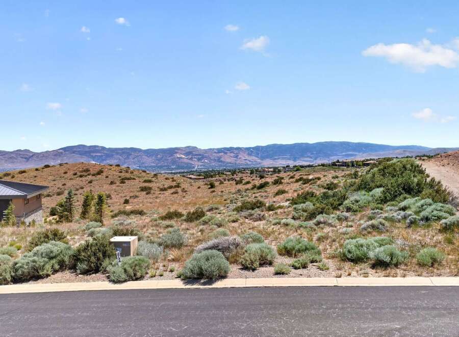 Discover breathtaking panoramic views from this prime piece of real estate, offering a serene escape into nature.