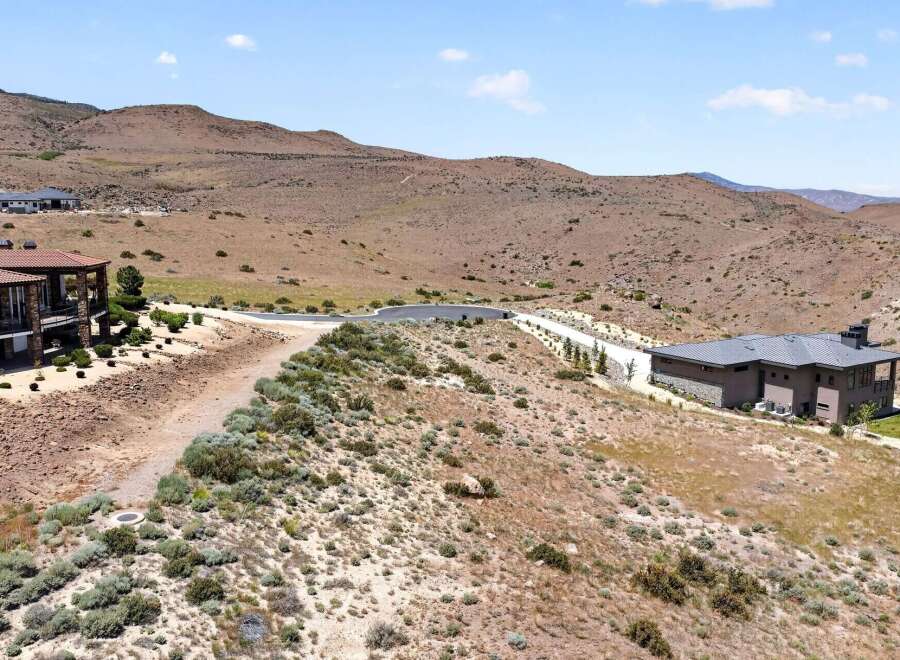 Discover luxury living in this stunning modern home, nestled amidst rolling hills and offering breathtaking panoramic views.