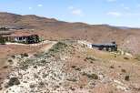 Discover luxury living in this stunning modern home nestled in a serene, arid landscape.