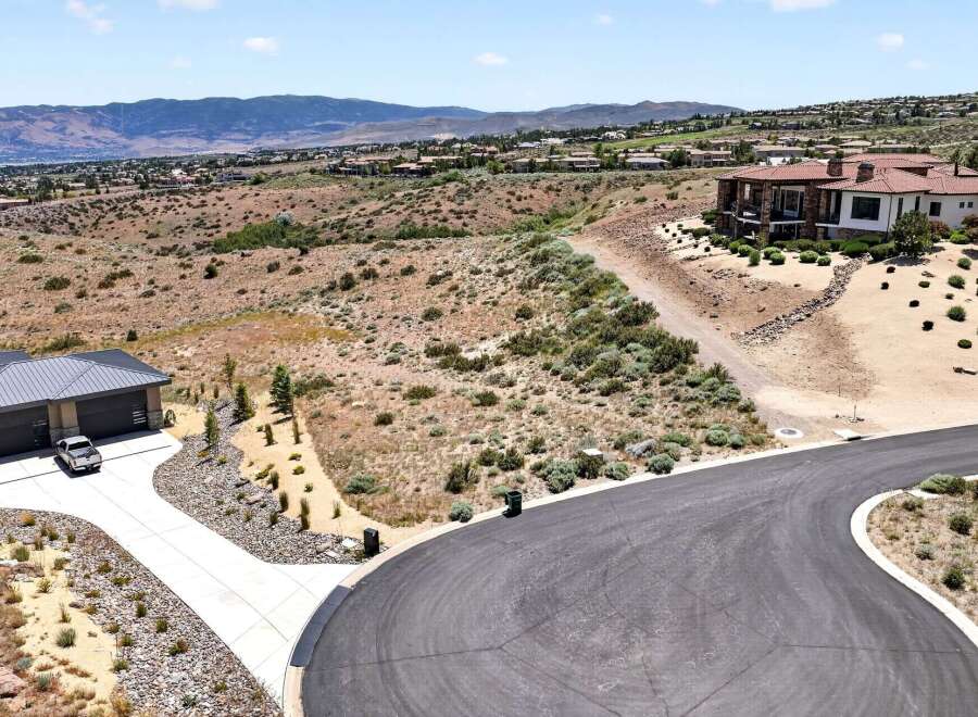 Discover luxury living in this stunning hillside estate, featuring a modern home with exquisite architectural details and expansive views.