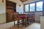 Experience cozy dining with this charming wooden table and chairs set, perfect for intimate gatherings.