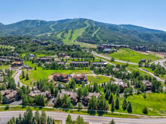 Experience luxury mountain living in this stunning property nestled amidst lush greenery and scenic mountain vistas.