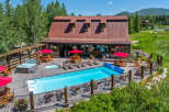 Experience luxury and relaxation at this stunning property featuring a sparkling swimming pool and a soothing hot tub, perfect for unwinding.